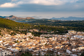 Fototapeta na wymiar Old town with historical buildings during day in Spain, Mallorca, Pollenca
