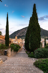 Fototapeta na wymiar Old town with historical buildings during day in Spain, Mallorca, Pollenca