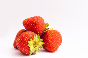 Fresh strawberries were placed on a white background