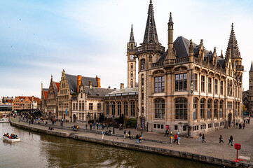 Obraz premium Medieval town with old buildings and stones in late autumn in Belgium, Ghent