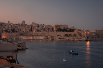 Sunset in small town on island in Malta