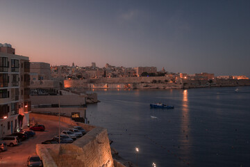 Sunset in small town on island in Malta