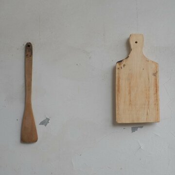 kitchen utensils on wooden background