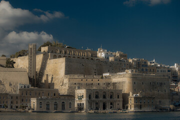 Fototapeta premium Bay with marina and boats during clear day on island of Malta