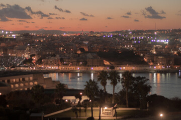Sunset in small town on island in Malta