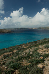Clear water from coast with beach and clear sky