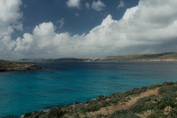 Clear water from coast with beach and clear sky