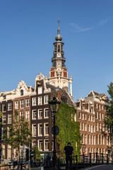 Obraz premium Street view with buildings and during day and canal in Amsterdam, Netherlands