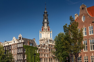 Street view with buildings and during day and canal in Amsterdam, Netherlands
