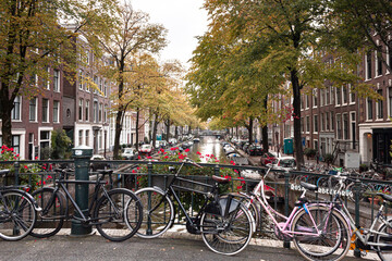 Obraz premium Street view with buildings and during day and canal in Amsterdam, Netherlands