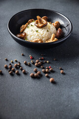 rice mushrooms risotto second course meal snack on the table copy space food background rustic veggie vegan or vegetarian food no meat