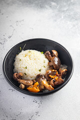 rice mushrooms risotto second course meal snack on the table copy space food background rustic veggie vegan or vegetarian food no meat