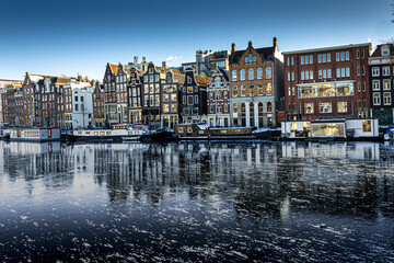 Snow covered streets with cold weather in Amsterdam, Netherlands