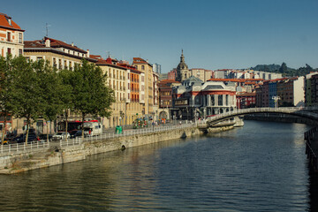Naklejka na ściany i meble Clear day in summer with sky in Bilbao, Spain