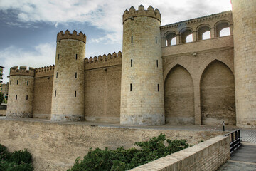 Old historical buildings during summer day in Zaragoza, Spain