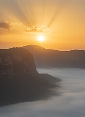 sunrise over the mountains, mist in the valley