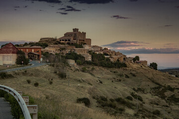Fototapeta na wymiar Beautiful small old town on top of hill in mountain area in Ujue, Navarra, Spain
