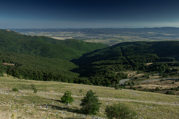 Mountain area with green hills on summer day in Buzludzha, Bulgaria