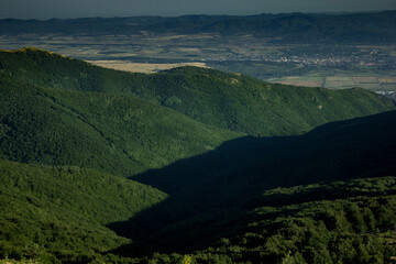 Mountain area with green hills on summer day in Buzludzha, Bulgaria