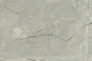 Obraz premium background. gray, cracked wall. old and worn, broken surface.