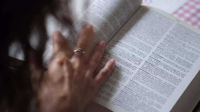 Translator looking for a word in the dictionary