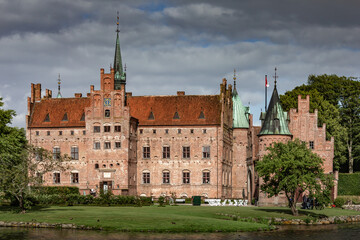 Castle estate during summer day in Egeskov Slot, Denmark