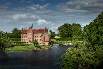 Fototapeta na wymiar Castle estate during summer day in Egeskov Slot, Denmark