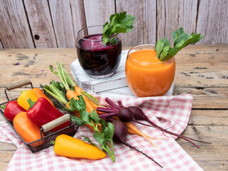 Fresh squeezed smoothie bell pepper, carrot, beetroot juice vegetable in a glass. Healthy eating,...