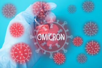 omicron vaccine,vaccination against a new variant of the coronavirus strain,vial with an injection...