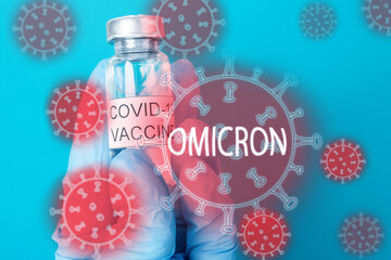 omicron vaccine,vaccination against a new variant of the coronavirus strain,vial with an injection...