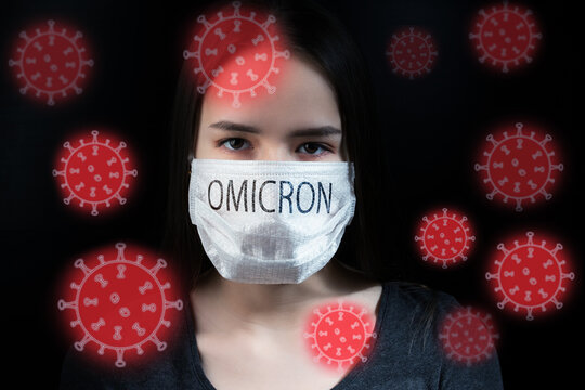 Omicron Variant Of The Coronavirus Mutation Of The New Strain Covid 19, Woman In Protective Medical Mask