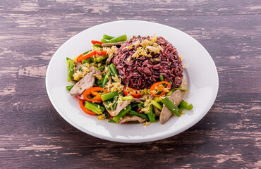 Stir fried onion flower stem with pork liver and rice berry