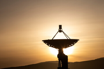 Observatory equipment, silhouette at sunrise