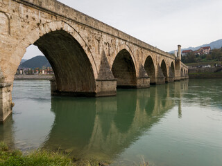 The old stone bridge of Mehmed Pasha Sokolovic over the river Drina in Visegrad