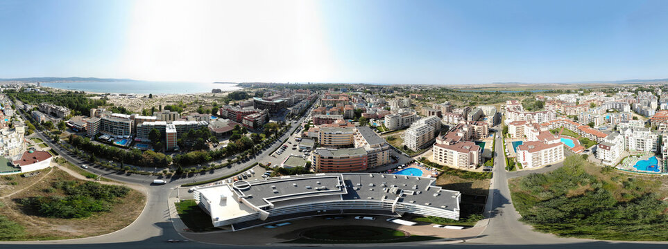 Aerial 360 Degree full sphere Panoramic photo view of the beach front on the beach of Sunny Beach in Bulgaria showing the beautiful view of the coastline and golden sandy beaches and ocean.