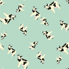 Seamless pattern cow on mint background. Texture of farm animals for any purpose.