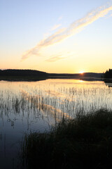 View of calm lake at sunset