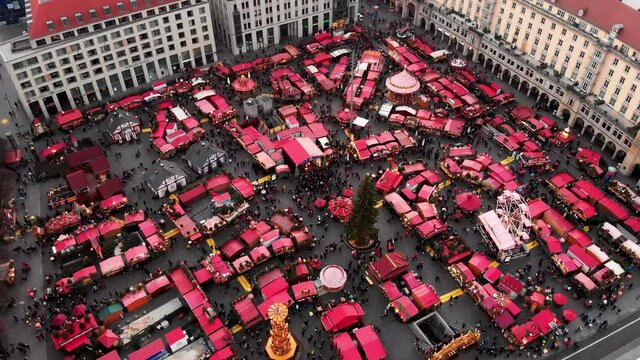 Drone shot Striezelmarkt Christmas market in Dresden.
Christmas toys of fairy tale characters at the fair in Dresden. Christmas in Dresden. Handmade toys. The oldest Christmas markets in the world. 