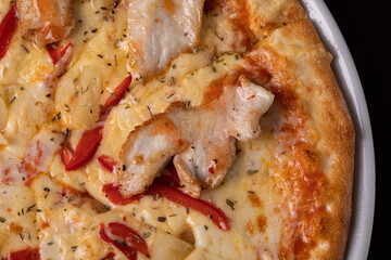 Pizza quattro stagioni four seasons pizza with cheese and chicken 