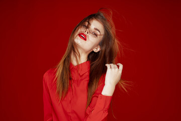 woman in red shirt posing fashion red lips fun