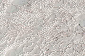 Pamukkale white and light red travertine striated texture