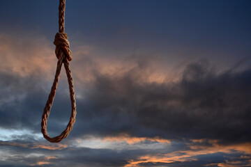 Rope noose on dramatic blue sky. Space for text - obrazy, fototapety, plakaty
