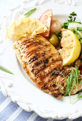 Grilled Turkey Breast with fresh salad. Close up. 