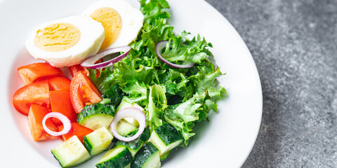salad eggs, vegetable, cucumber, tomato, lettuce veggie healthy meal snack diet on the table copy space food background  keto or paleo diet vegetarian food no meat