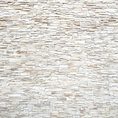 Sandstone brick wall texture and background.