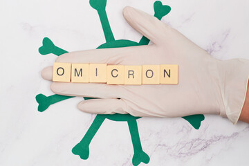 letter blocks with the word omicron new variant of coronavirus, covid-19