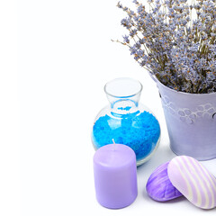 salt, scented candle, soap and dried lavender flowers isolated on a white background. Free space for text.