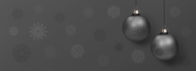 Glänzende Silberfarbene Weihnachtskugeln am Band vor einem Hintergrund mit Schneekristallen