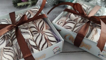 Obraz na płótnie Canvas Marshmallow in festive packaging. Christmas sweets.