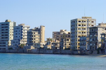 Fototapeta na wymiar Varosha, once famous beach resort destination is now spooky ghost town, only with few tourist.12.07.2021 Famagusta, Northern Cyprus